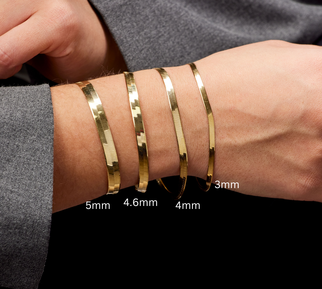 real solid gold herringbone bracete
