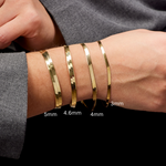 real solid gold herringbone bracete 